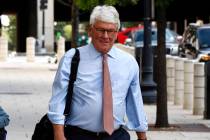 FILE - In this Aug. 22, 2019, file photo, Greg Craig, right, former White House counsel to form ...