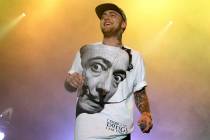 FILE - In this July 13, 2013, file photo, rapper Mac Miller performs on his Space Migration Tou ...