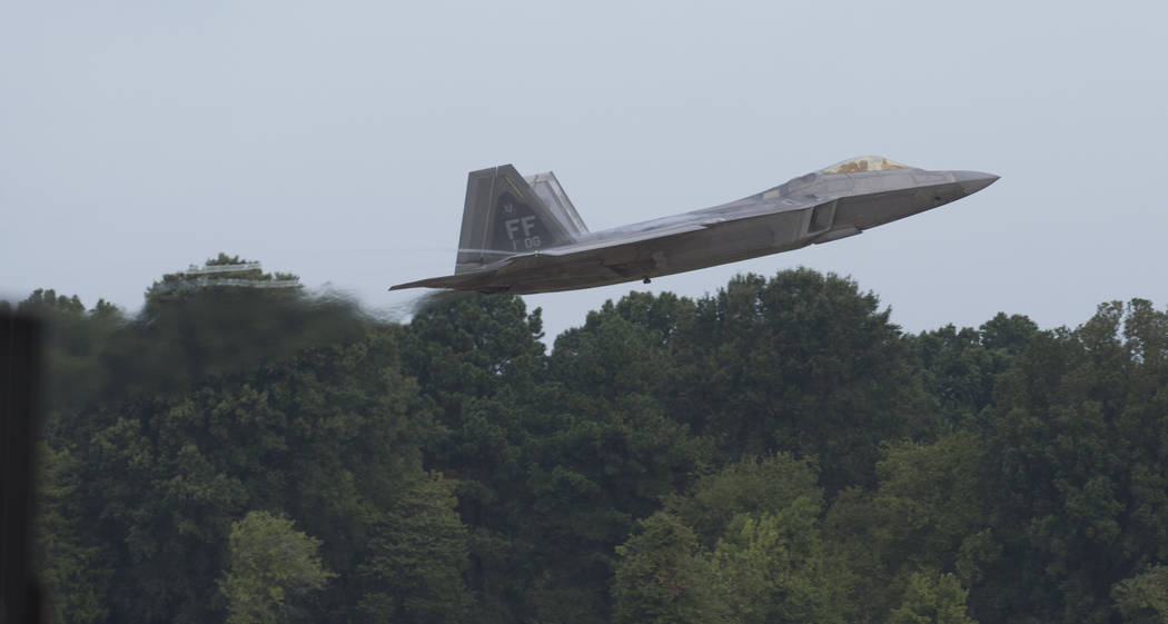 An F-22 Raptor jet clears the runway after takeoff at Langley Air Force Base on Wednesday, Sept ...