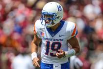 Boise State quarterback Hank Bachmeier (19) after handing off the ball during an NCAA football ...