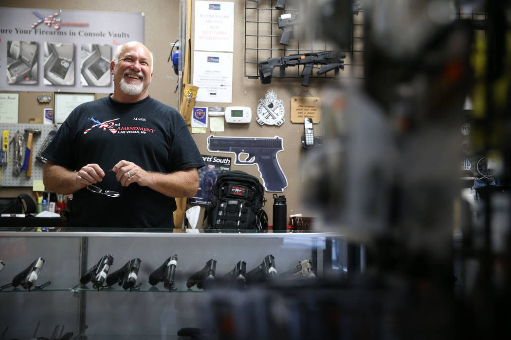 Mark Hames, owner of 2nd Amendment Gun Shop, is interviewed in his Las Vegas store, Wednesday, ...