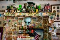 Alien memorabilia behind the bar and the restaurant at the Little A'Le'Inn which is to be a gat ...