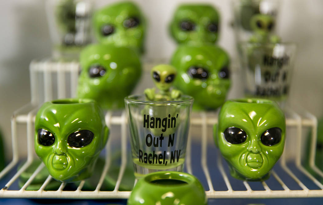 Alien shot glasses for sale in the restaurant at the Little A'Le'Inn which is to be a gathering ...