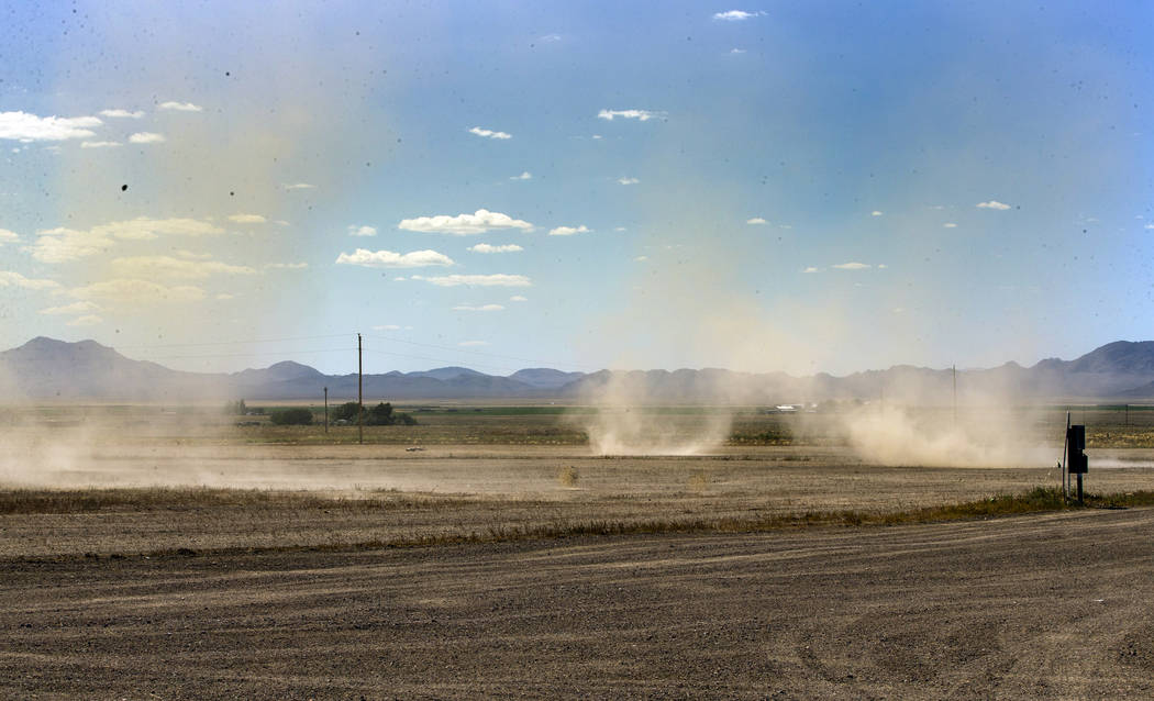 Dust devils kick up at the newly leveled site beside the Little A'Le'Inn which is to be the per ...