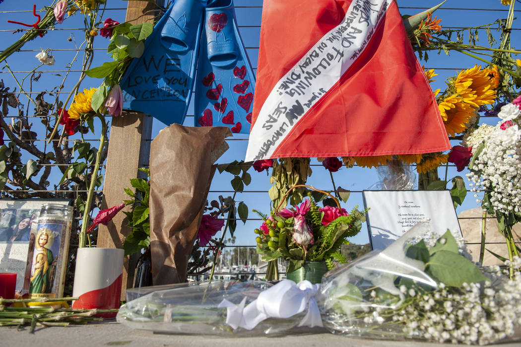 Items are placed at a memorial for the victims of Monday's dive boat fire at the Santa Barbara ...