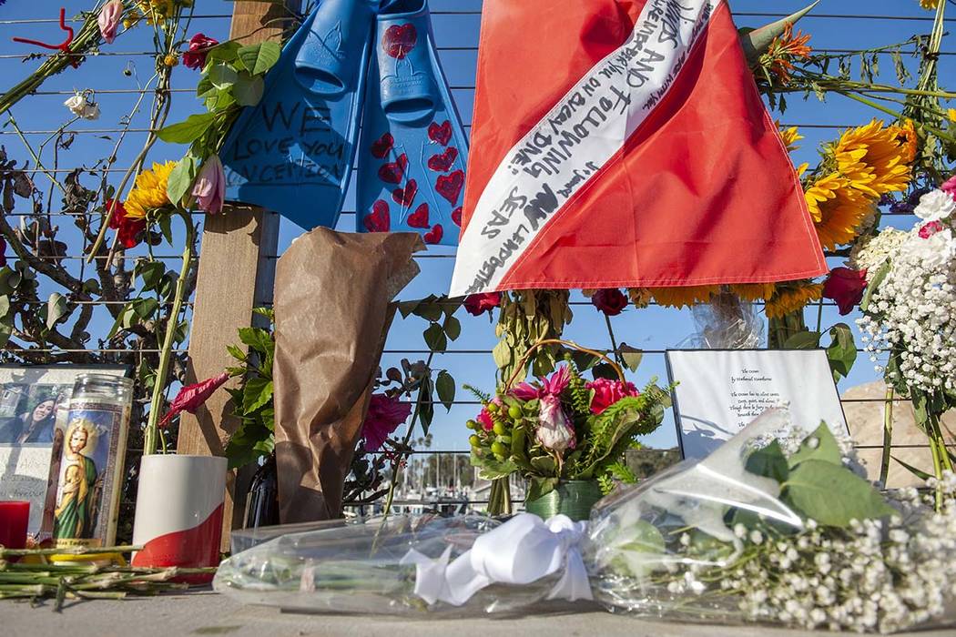 Items are placed at a memorial for the victims of Monday's dive boat fire at the Santa Barbara ...