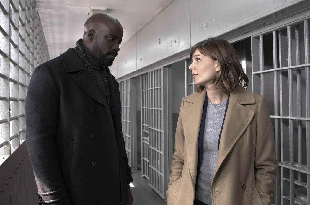 This image released by CBS shows Mike Colter, left, and Katja Herbers in a scene from "Evi ...