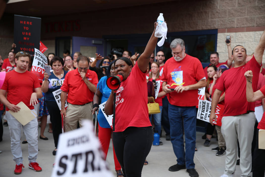 Linda Jones of Clark County Education Association, center, rallies the crowd after a Clark Coun ...