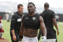 Oakland Raiders' Antonio Brown walks off the field after NFL football practice in Alameda, Cali ...