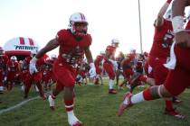 The Liberty High school football players take the field against Chandler, Ariz., in 2018 in Hen ...