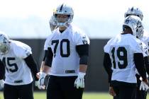 Oakland Raiders offensive guard Jordan Devey (70) warms up during an offseason training session ...