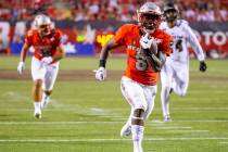 UNLV Rebels running back Charles Williams (8) runs for a touchdown over Southern Utah during th ...