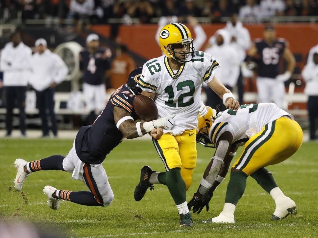 Chicago Bears' Ha Ha Clinton-Dix strips the ball from Green Bay Packers' Aaron Rodgers during t ...