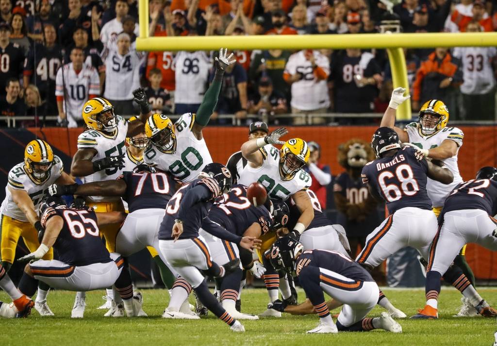 Chicago Bears' Eddy Pineiro kicks 1 field goal during the first half of an NFL football game ag ...