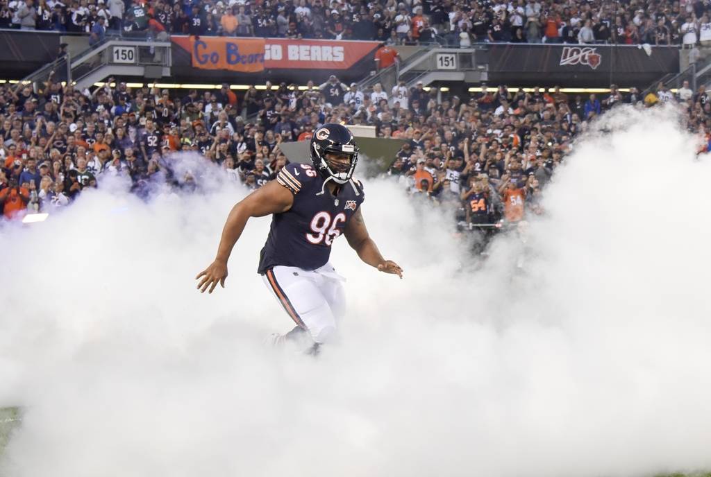 Chicago Bears' Akiem Hicks is introduced before an NFL football game against the Green Bay Pack ...