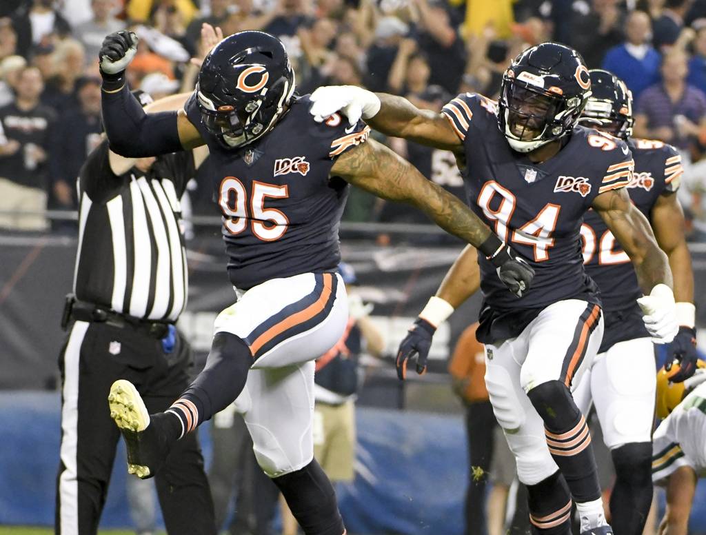 Chicago Bears' Roy Robertson-Harris reacts after sacking Green Bay Packers' Aaron Rodgers durin ...