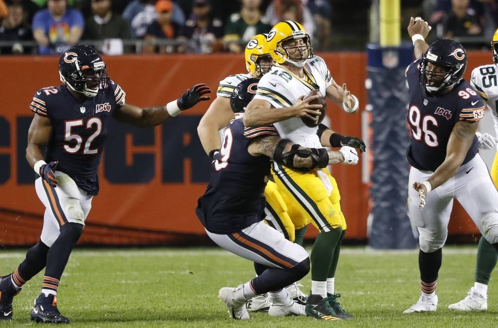 Green Bay Packers' Aaron Rodgers is sacked by Chicago Bears' Aaron Lynch during the second half ...