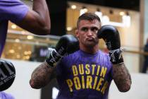 UFC fighter Dustin Poirier of Lafayette, Louisiana, spars with a partner during an open trainin ...
