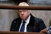 Britain's Prime Minister Boris Johnson visits Darnford Farm in Banchory near Aberdeen, Scotland ...