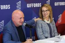 Retired NASA astronaut and Navy Capt. Mark Kelly speaks as his wife, former U.S. Rep. Gabby Gif ...