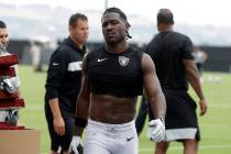 Oakland Raiders' Antonio Brown walks off the field after NFL football practice in Alameda, Cali ...