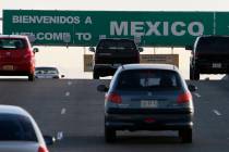 Southbound vehicles leave El Paso, Texas and enter Juarez, Mexico at the Bridge of the Americas ...