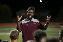 Faith Lutheran football coach Vernon Fox III talks to his team after their loss to Valor Christ ...