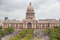 In this March 24, 2018, file photo, thousands of people gather on the grounds of the Texas Stat ...