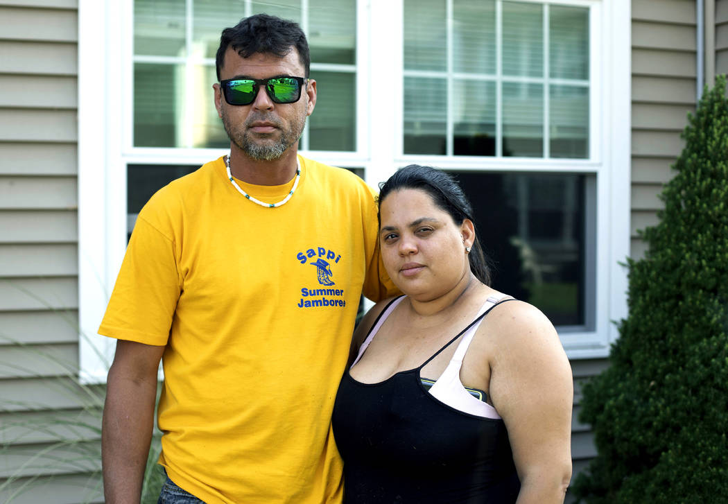 In this Aug. 2, 2019 photo, Ashlyn Gonzales, right, and her longtime partner Emanuel Rivera pos ...