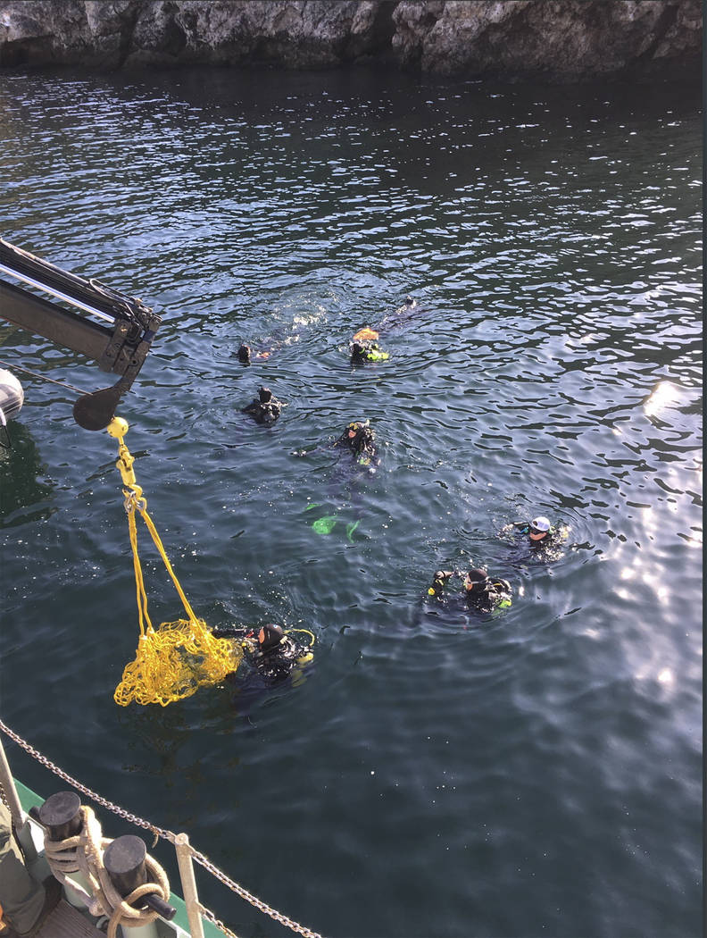 This photo provided by Santa Barbara County on Wednesday, Sept. 4, 2019 shows divers and suppor ...
