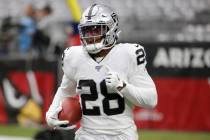 Oakland Raiders running back Josh Jacobs (28) warms up prior to an NFL football game against th ...