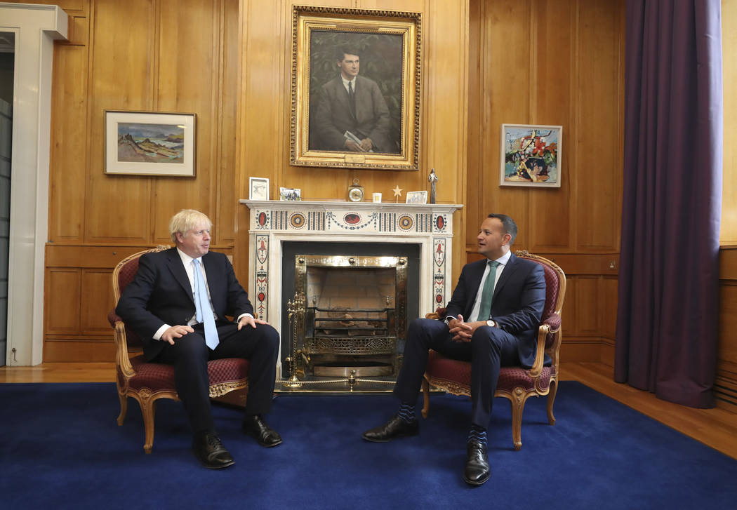 Britain's Prime Minister Boris Johnson, left, meets with Ireland's Prime Minister Leo Varadkar ...