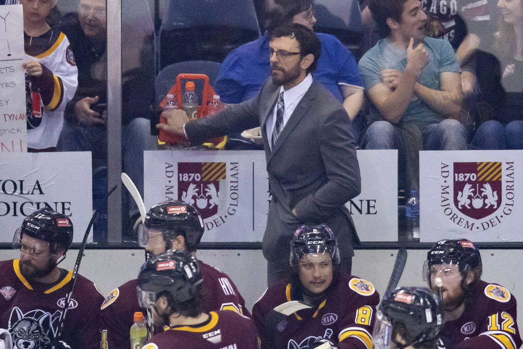 ROSEMONT, IL - JUNE 06: Chicago Wolves head coach Rocky Thompson looks on during game four of t ...