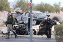 Las Vegas police investigate a three-vehicle crash at the intersection of Flamingo and El Capit ...