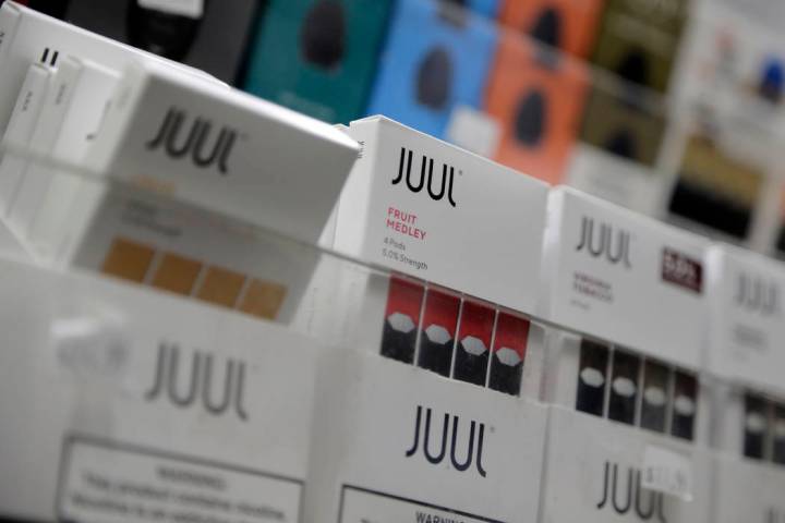 A Dec. 20, 2018, file photo shows Juul products displayed at a smoke shop in New York. Federal ...