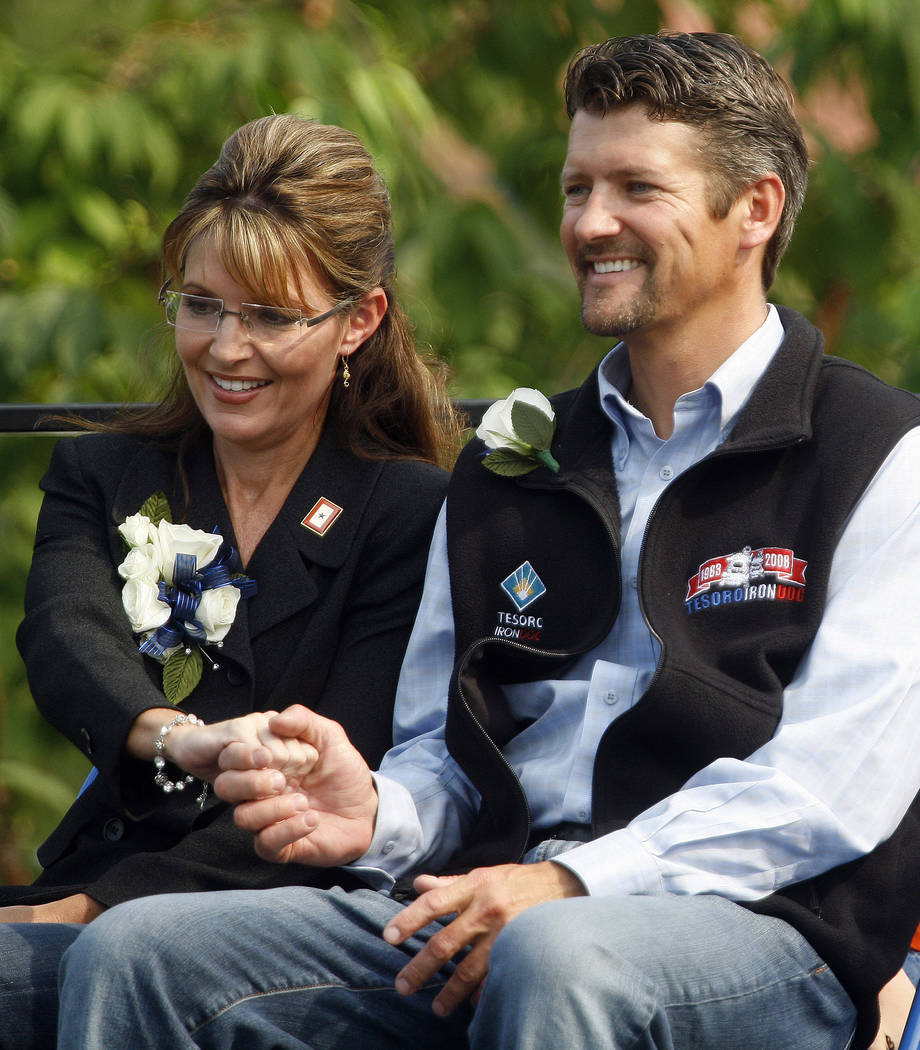 FILE - In this July 26, 2009, file photo, former Alaska Gov. Sarah Palin holds her husband's To ...
