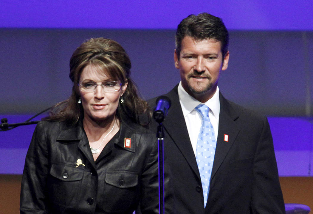 In this June 8, 2009, file photo, Republican Alaska Gov. Sarah Palin and her husband Todd Palin ...