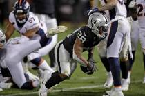 Oakland Raiders running back Josh Jacobs reacts after scoring a touchdown during the fourth qua ...