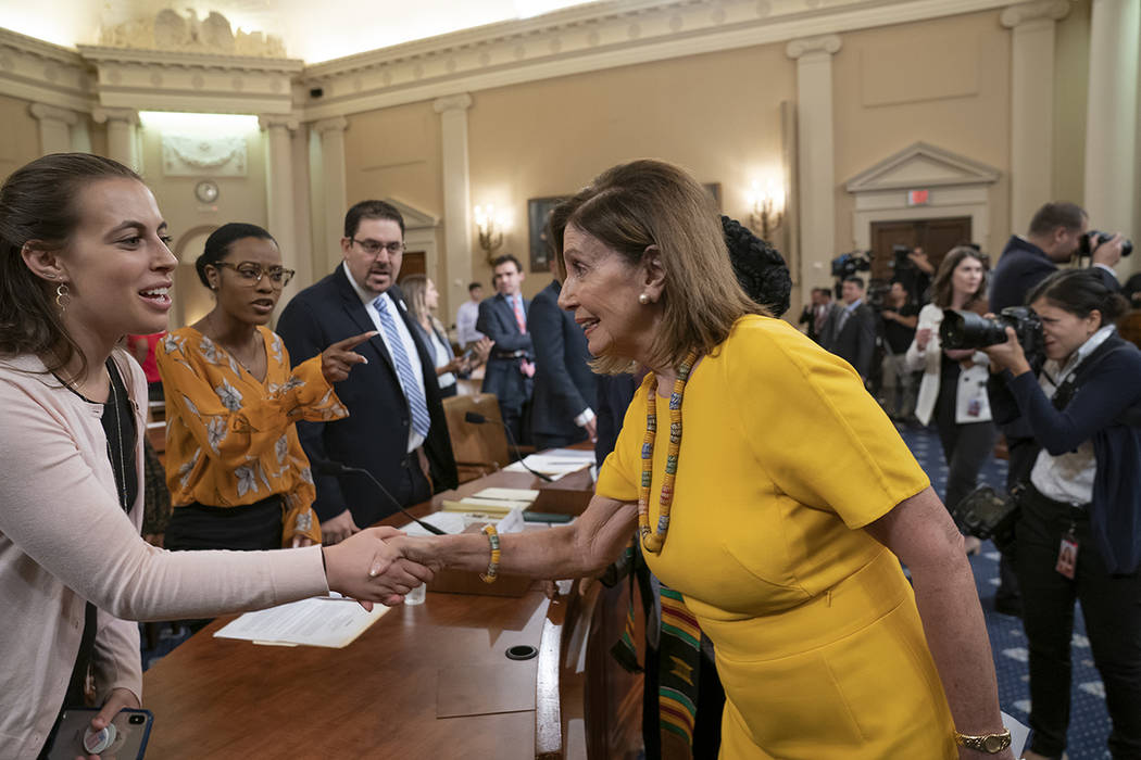 House Speaker Nancy Pelosi, D-Calif., arrives to participate in the House Gun Violence Preventi ...