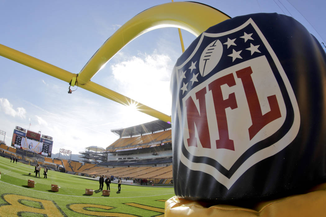 The NFL Logo is on a pad on the goal post at Heinz Field before an NFL football game between th ...