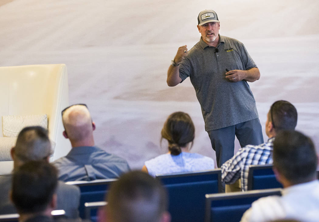 Retired Master Sgt. Scott Neill, who co-founded the American Freedom Distillery, speaks during ...