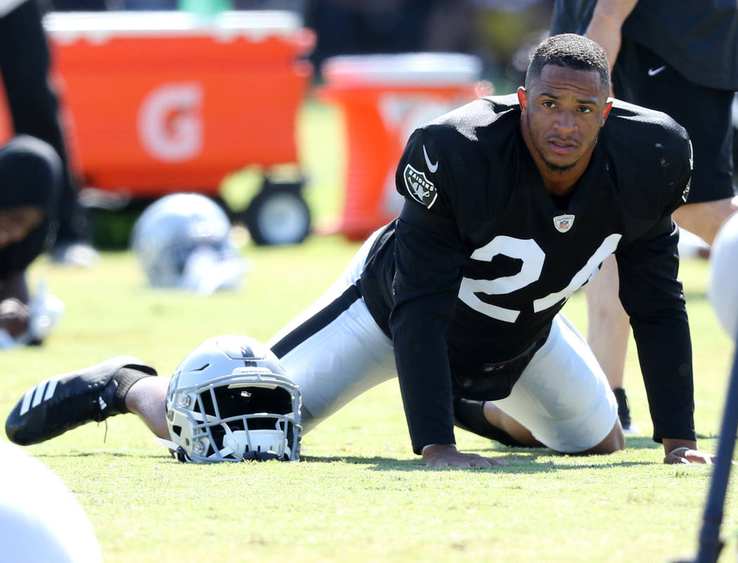 Oakland Raiders safety Johnathan Abram (24) warms up during the NFL team's joint training camp ...