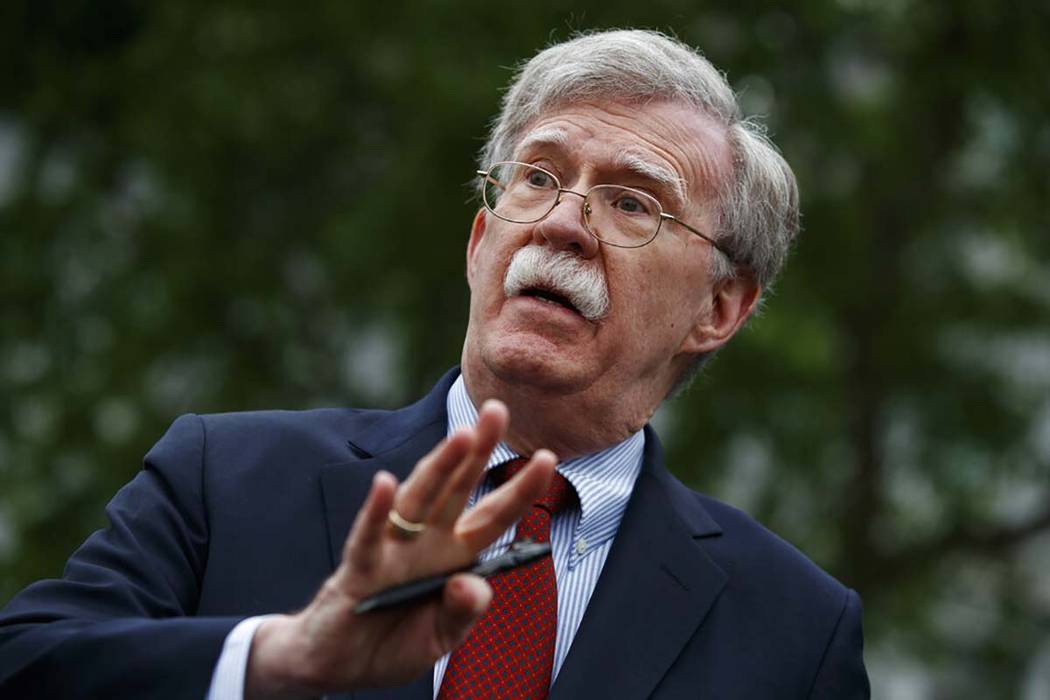 In a May 1, 2019, file photo, National security adviser John Bolton talks to reporters outside ...