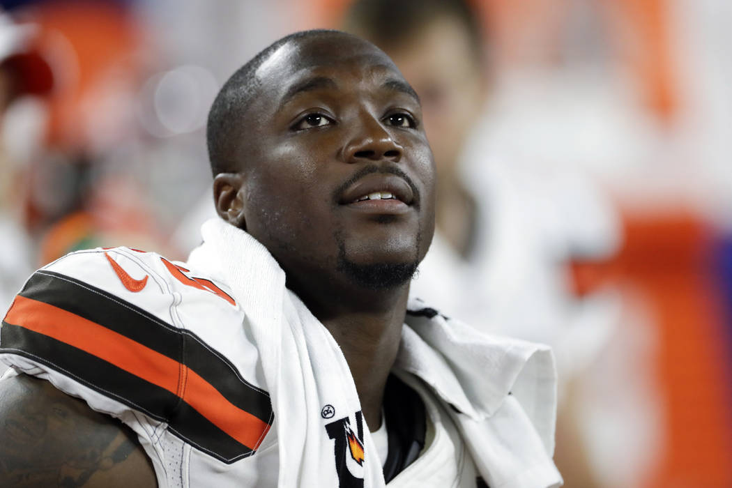 Cleveland Browns defensive end Chris Smith (50) sits on the sideline during the first half of a ...