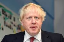 Britain's Prime Minister Boris Johnson visits Pimlico Primary school in London, Tuesday July 10 ...
