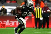 Oakland Raiders running back Marshawn Lynch (24) runs with the football during the first half o ...