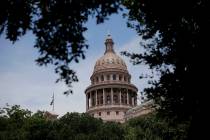 FILE - In This July 30, 2013, file photo, the dome of the Texas State Capital is seen through t ...