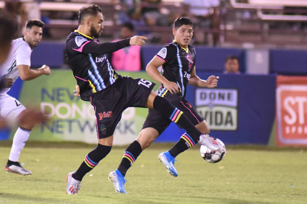 Lights defender Bryan De La Fuente, right, shown last month, fed a pass into the goal mouth tha ...