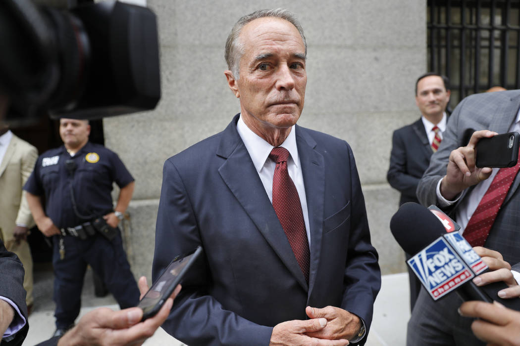 U.S. Rep. Chris Collins, R-N.Y., speaks to reporters as he leaves the courthouse after a pretri ...