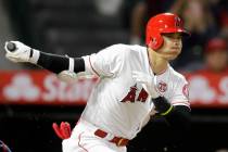 Los Angeles Angels' Shohei Ohtani, of Japan, watches a foul ball during the third inning of a b ...